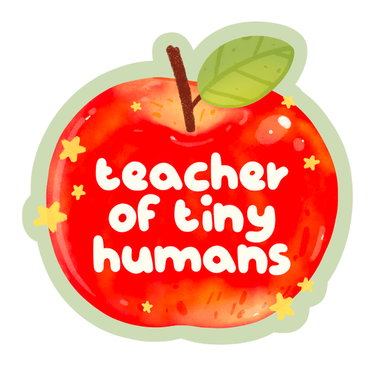 teacher of tiny humans sticker — shiny red apple with a green leaf, sparkles, and hand lettering