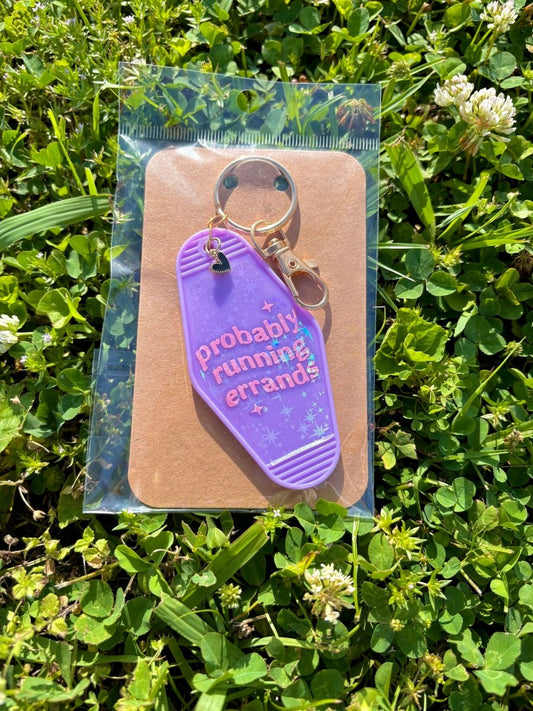 handmade motel style purple holographic acrylic keychain iridescent lettering probably running errands sparkle details gold clasp black heart charm