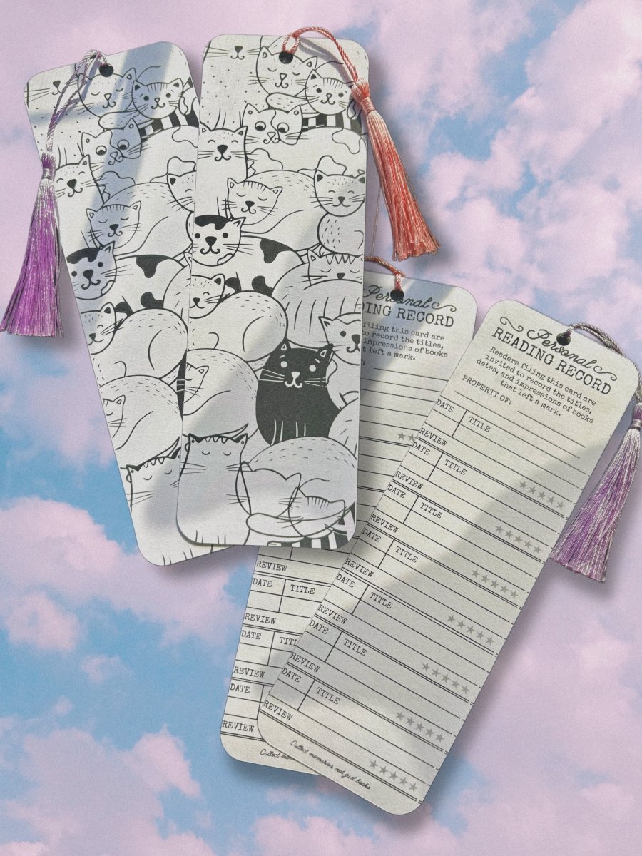 color your own bookmarks diy hand-drawn designs - stack of books cats dogs mushrooms - happy doodle studio