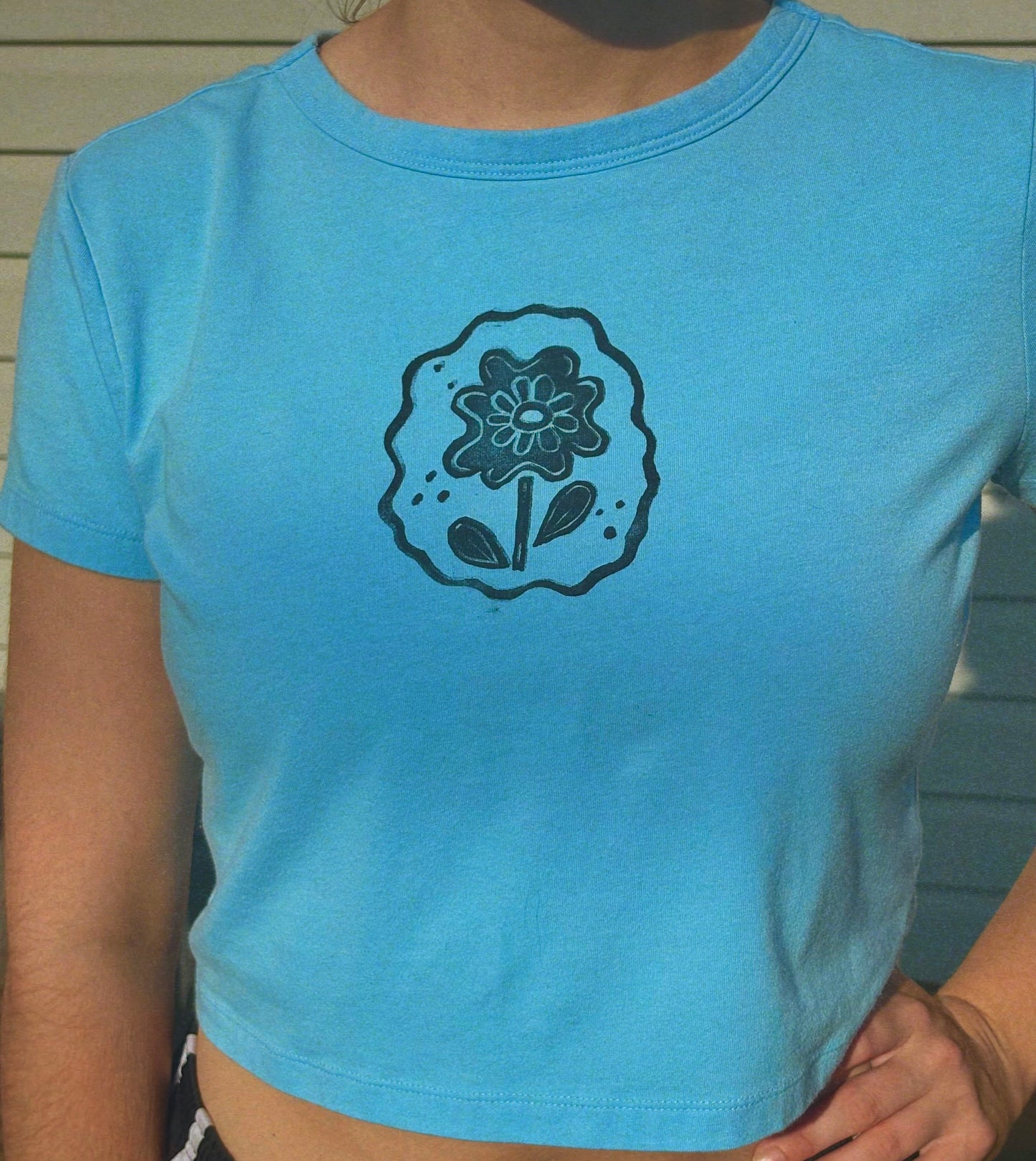 block-printed flower baby tee · powder blue