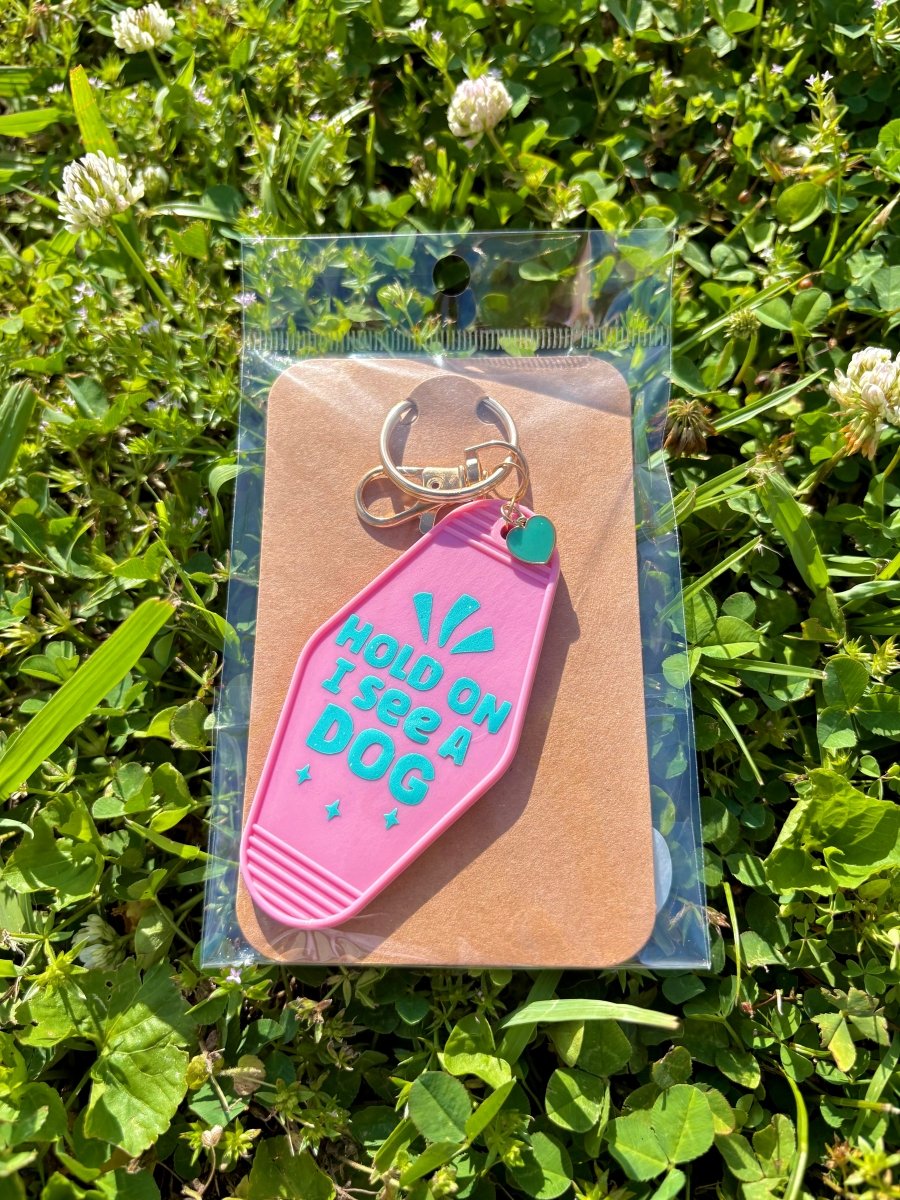 handmade motel style pink acrylic keychain teal lettering hold on i see a dog gold clasp teal heart charm